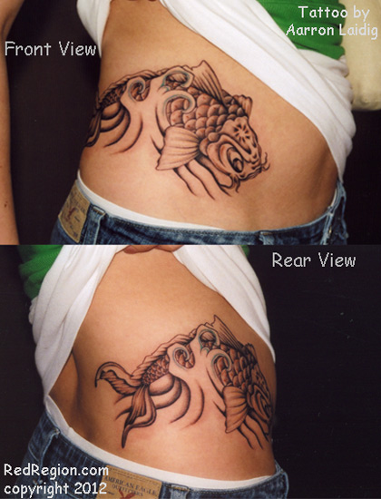 Tattooed black work koi on female hip