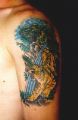 a tiger tattoo with water